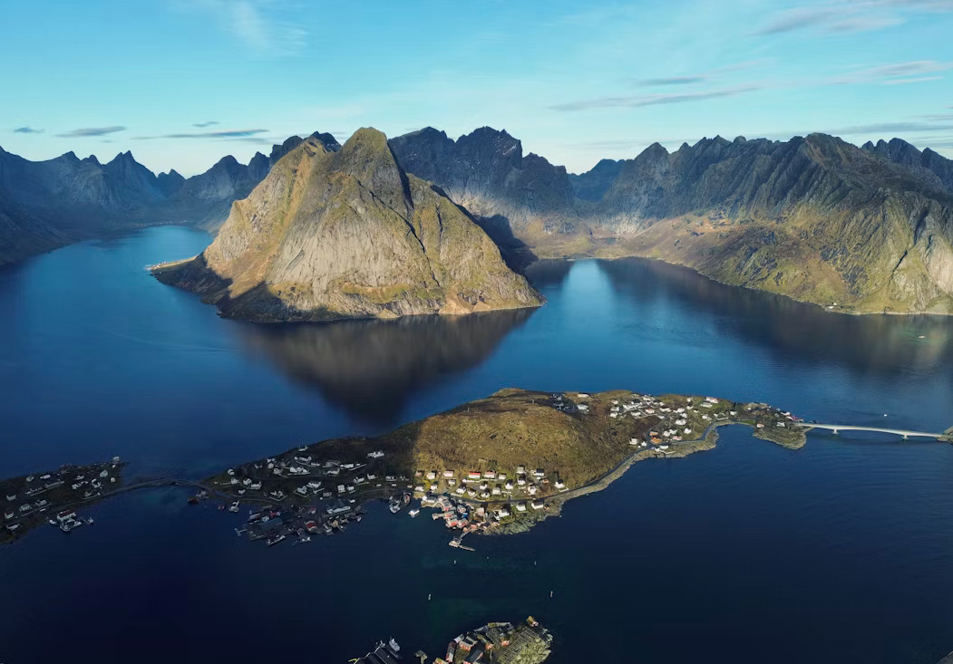 Steep coastal mountains and fjord in the Lofoten Islands, Norway